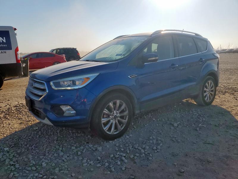 FORD ESCAPE TIT 2018 with VIN 1FMCU9J99JUA71349 - Photo from auction
