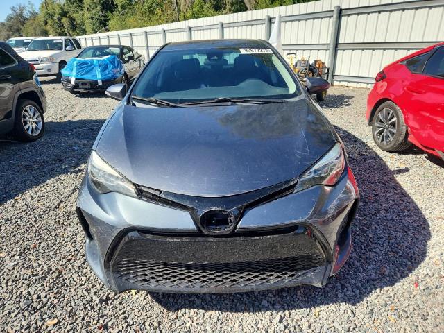 Photo 5 from auction – 2017 TOYOTA COROLLA L with VIN 5YFBURHE1HP661670