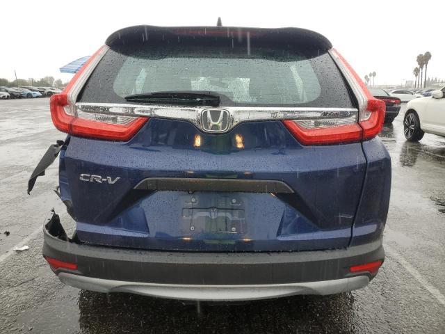 Photo 6 from auction – 2017 HONDA CR-V LX with VIN 7FARW5H38HE004428