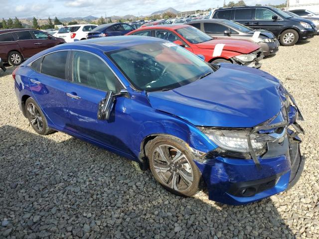 Photo 4 from auction – 2016 HONDA CIVIC with VIN 2HGFC1F94GH638451