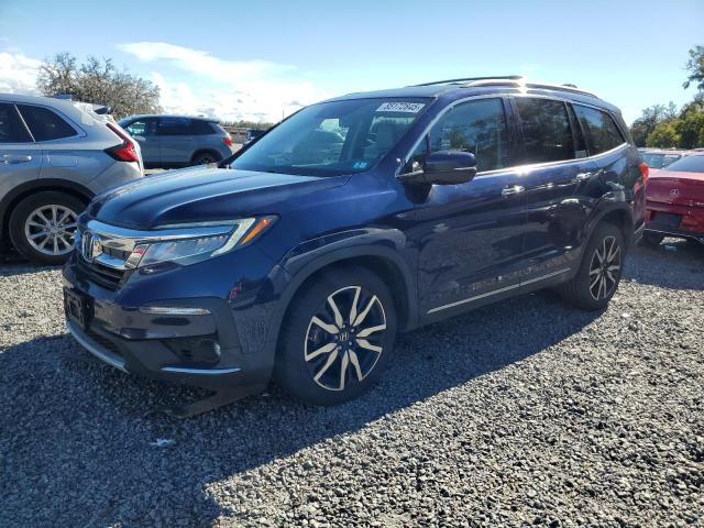 HONDA PILOT TOURING 2019 with VIN 5FNYF6H69KB087950 - Photo from auction