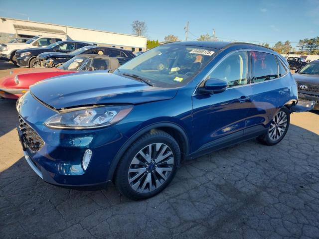FORD ESCAPE TITANIUM 2020 with VIN 1FMCU9J98LUA20511 - Photo from auction