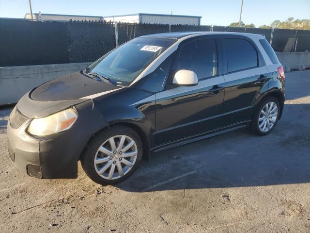 SUZUKI SX4 2012 with VIN JS2YA5A57C6300245 - Photo from auction