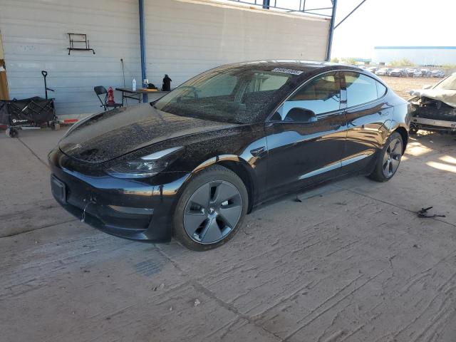 TESLA MODEL 3 2023 с VIN 5YJ3E1EA3PF647543 - Снимка от търг