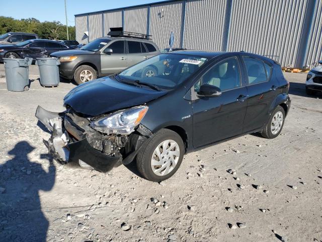 TOYOTA PRIUS C 2015 with VIN JTDKDTB33F1098854 - Photo from auction