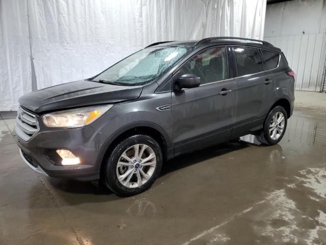 FORD ESCAPE SE 2018 with VIN 1FMCU9GD5JUD06082 - Photo from auction