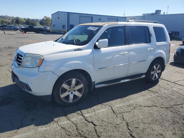 HONDA PILOT TOUR 2013 with VIN 5FNYF4H95DB070466 - Photo from auction