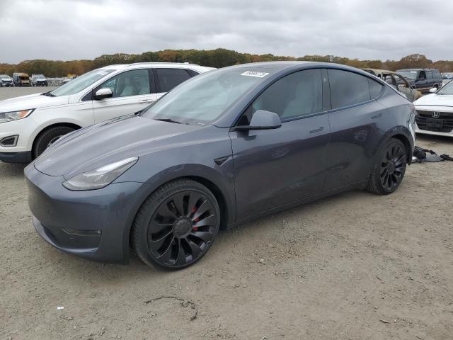 TESLA MODEL Y 2023 with VIN 7SAYGDEF2PF899526 - Photo from auction