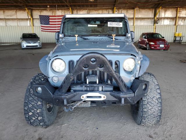 Photo 5 from auction – 2014 JEEP WRANGLER U with VIN 1C4HJWFG4EL267669