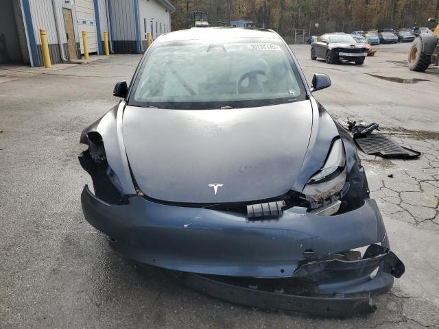 Photo 5 from auction – 2021 TESLA MODEL 3 with VIN 5YJ3E1EA0MF989690