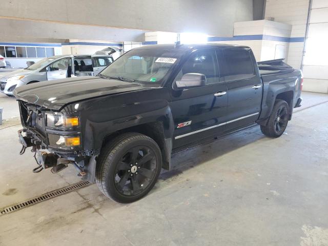CHEVROLET SILVERADO 2015 with VIN 3GCUKREH2FG516640 - Photo from auction