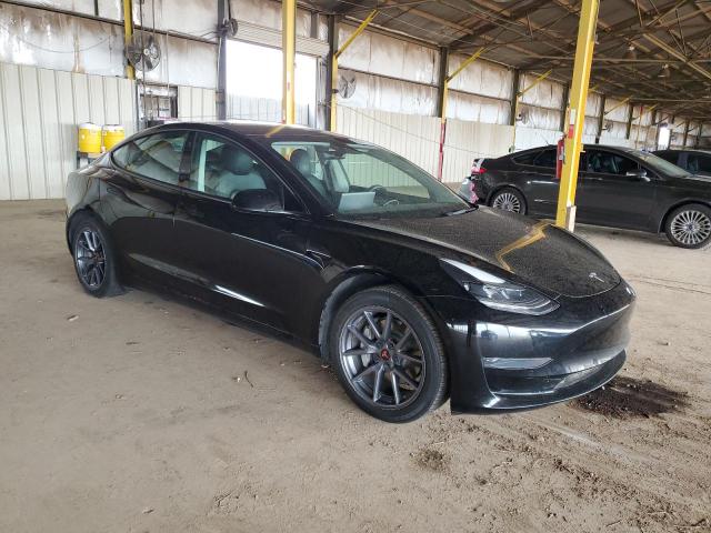Photo 4 from auction – 2022 TESLA MODEL 3 with VIN 5YJ3E1EA7NF210996