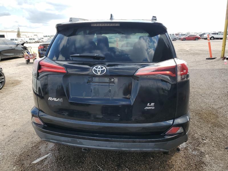 Photo 6 from auction – 2018 TOYOTA RAV4 LE with VIN 2T3BFREV7JW808231