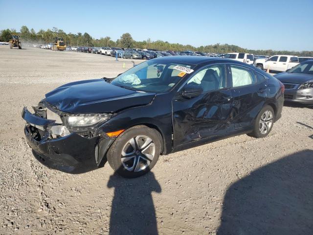 HONDA CIVIC LX 2018 with VIN 19XFC2F57JE024174 - Photo from auction