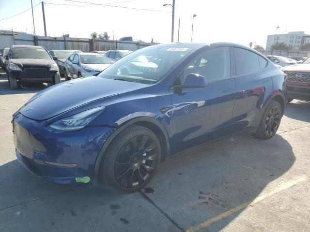 TESLA MODEL Y 2023 with VIN 7SAYGDEE9PA077875 - Photo from auction