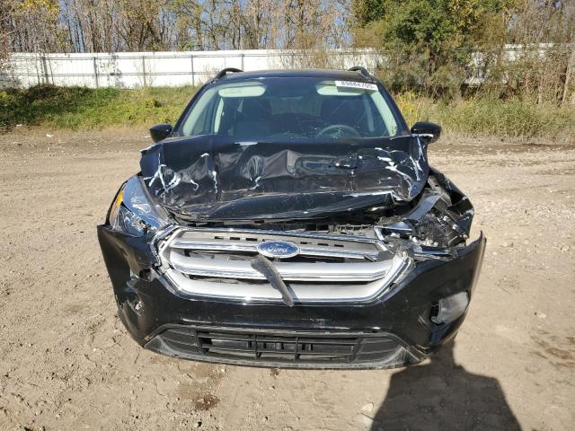 Photo 5 from auction – 2018 FORD ESCAPE SE with VIN 1FMCU9GD2JUD49780