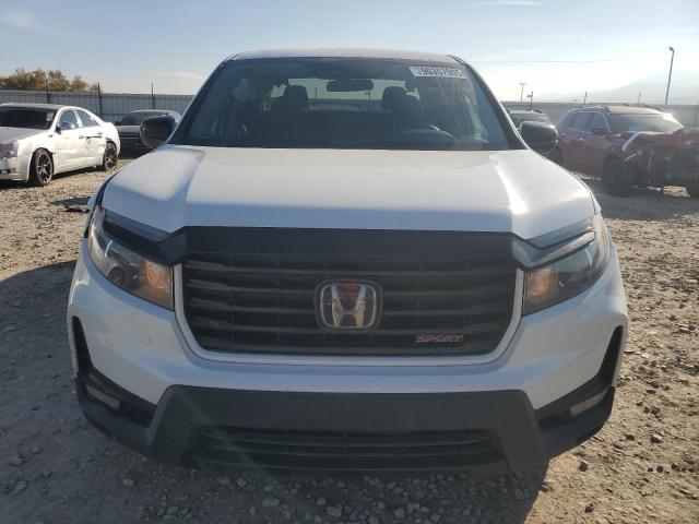 Photo 5 from auction – 2021 HONDA RIDGELINE with VIN 5FPYK3F12MB011434