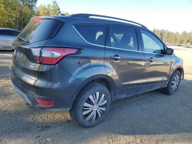 Photo 3 from auction – 2018 FORD ESCAPE SE with VIN 1FMCU9GD0JUB17887