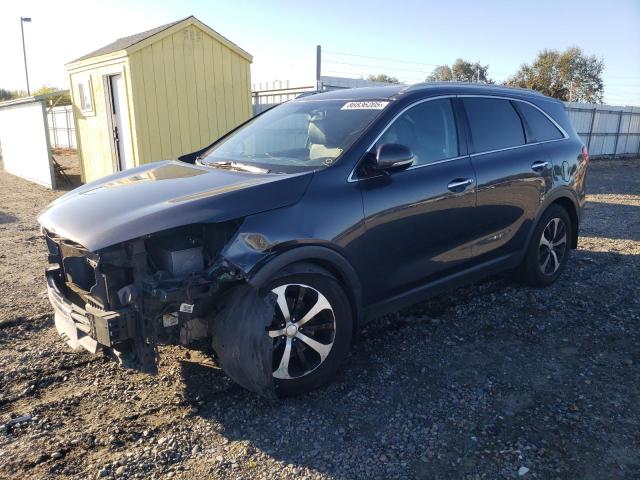 KIA SORENTO EX 2016 with VIN 5XYPH4A14GG021203 - Photo from auction