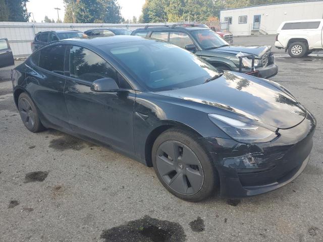 Photo 4 from auction – 2022 TESLA MODEL 3 with VIN 5YJ3E1EB5NF352059