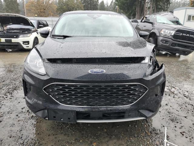 Photo 5 from auction – 2021 FORD ESCAPE SE with VIN 1FMCU9G64MUB07983