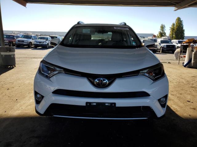 Photo 5 from auction – 2017 TOYOTA RAV4 XLE with VIN JTMWFREV7HJ107098