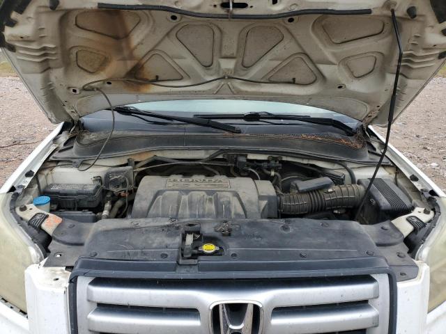Photo 12 from auction – 2006 HONDA PILOT LX with VIN 2HKYF18186H518972