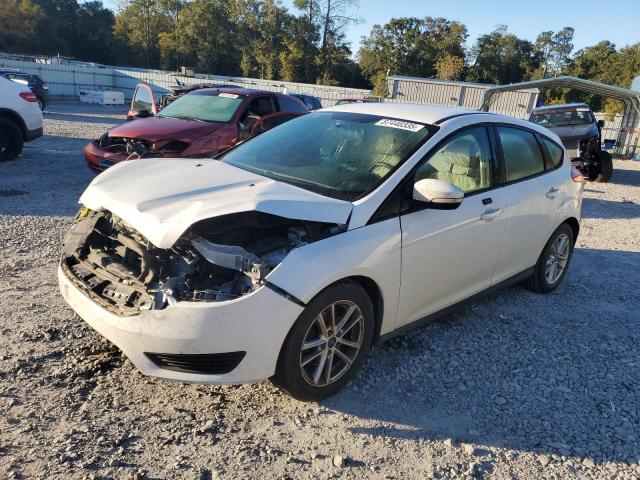 FORD FOCUS SE 2015 with VIN 1FADP3K21FL365717 - Photo from auction