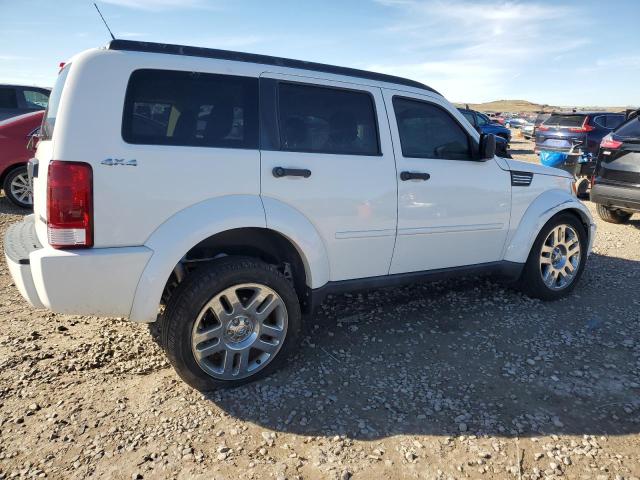 Photo 3 from auction – 2011 DODGE NITRO HEAT with VIN 1D4PU4GX0BW554364