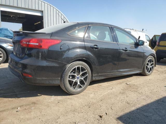 Photo 3 from auction – 2015 FORD FOCUS SE with VIN 1FADP3F27FL314488