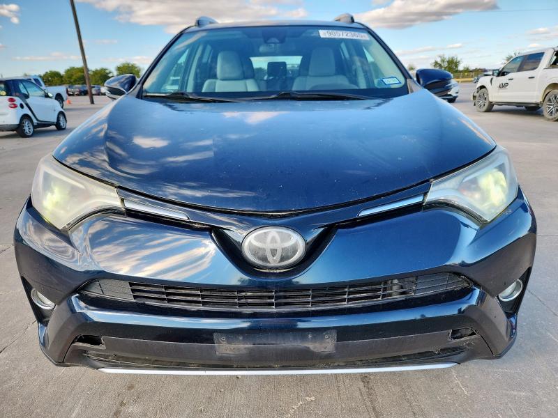 Photo 5 from auction – 2017 TOYOTA RAV4 XLE with VIN 2T3RFREV5HW650822