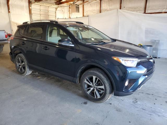 Photo 4 from auction – 2017 TOYOTA RAV4 XLE with VIN JTMRFREV9HJ110081