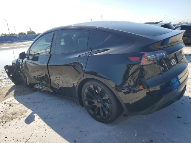 Photo 2 from auction – 2024 TESLA MODEL Y with VIN 7SAYGDED9RF089599