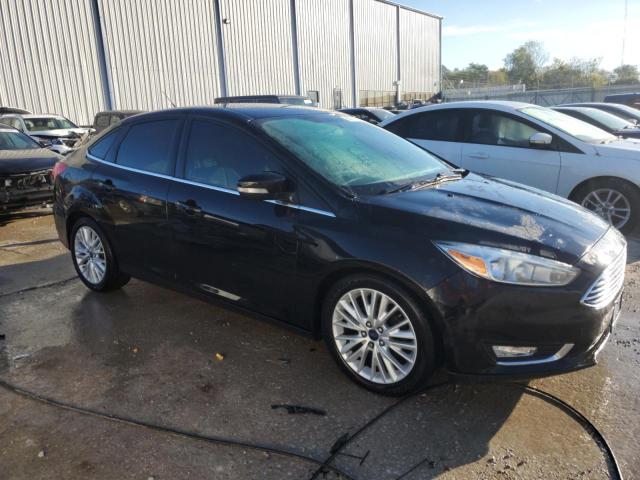 Photo 4 from auction – 2016 FORD FOCUS TITA with VIN 1FADP3J21GL245807