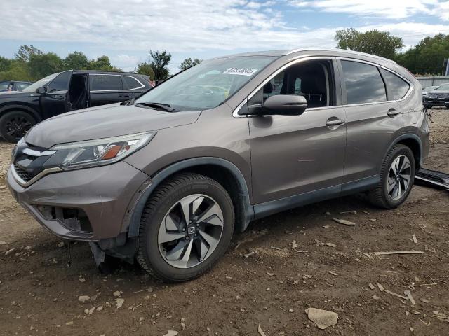 HONDA CR-V TOURI 2016 with VIN 5J6RM4H91GL083558 - Photo from auction