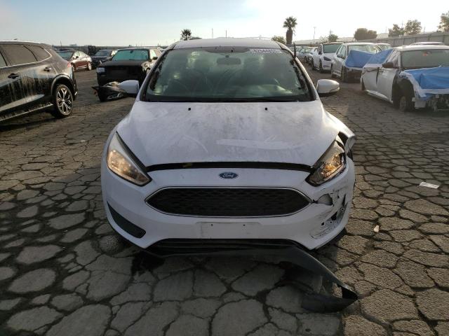 Photo 5 from auction – 2015 FORD FOCUS SE with VIN 1FADP3F24FL220343
