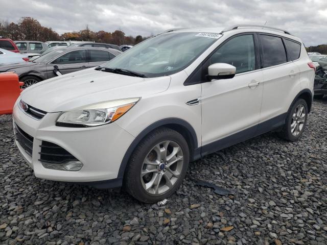 FORD ESCAPE TIT 2014 with VIN 1FMCU9J99EUE57730 - Photo from auction