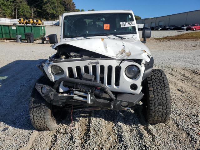 Photo 5 from auction – 2014 JEEP WRANGLER U with VIN 1C4BJWEG0EL128159