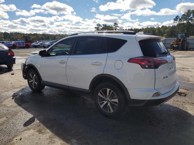 Photo 2 from auction – 2017 TOYOTA RAV4 XLE with VIN JTMWFREV3HJ147680