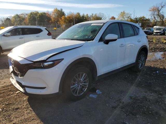 MAZDA CX-5 SPORT 2018 with VIN JM3KFBBM6J0360420 - Photo from auction