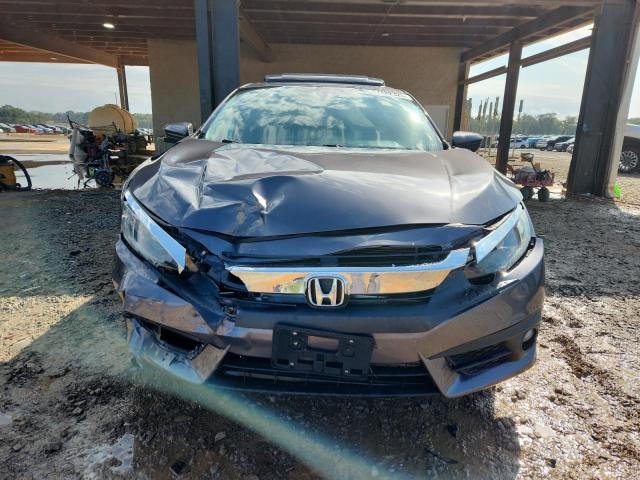 Photo 5 from auction – 2016 HONDA CIVIC EX with VIN 2HGFC1F30GH630374
