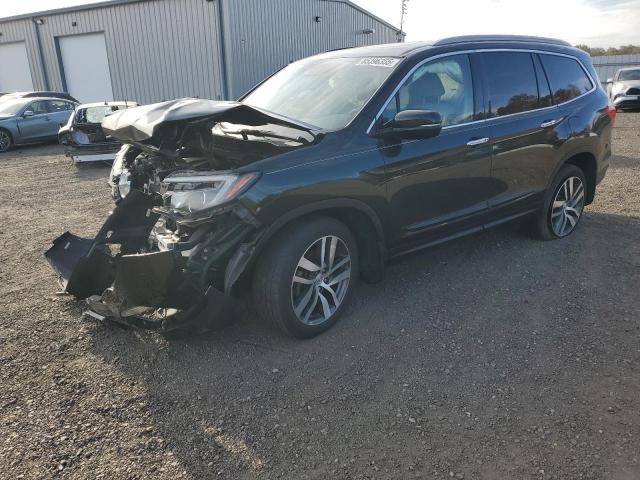 HONDA PILOT ELIT 2016 with VIN 5FNYF6H00GB118683 - Photo from auction