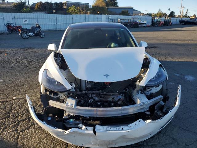 Photo 5 from auction – 2021 TESLA MODEL 3 with VIN 5YJ3E1EB9MF937919