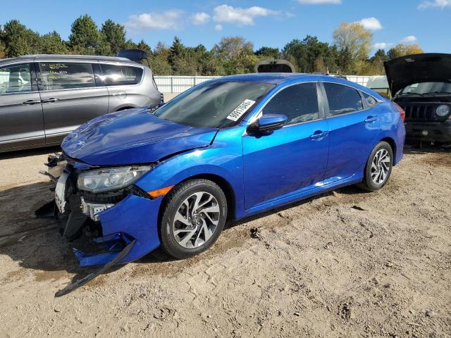 HONDA CIVIC EX 2018 with VIN 2HGFC2F70JH600856 - Photo from auction