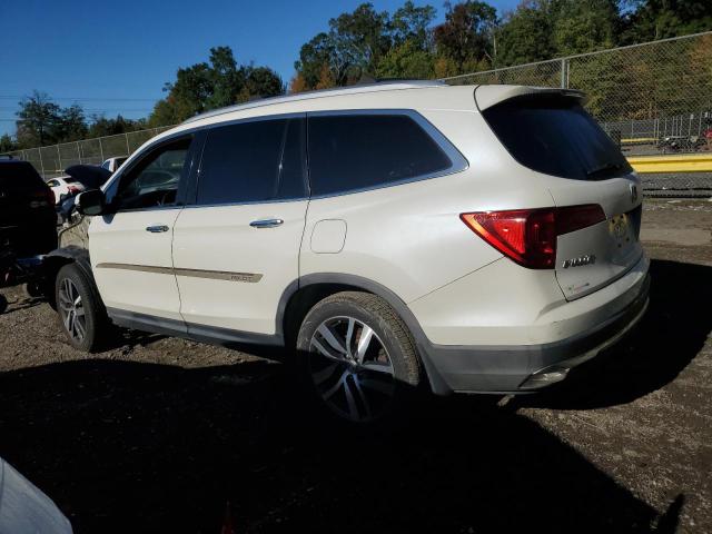 Photo 2 from auction – 2017 HONDA PILOT TOURING with VIN 5FNYF5H94HB013056