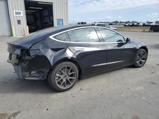 Photo 3 from auction – 2020 TESLA MODEL 3 with VIN 5YJ3E1EA3LF808077