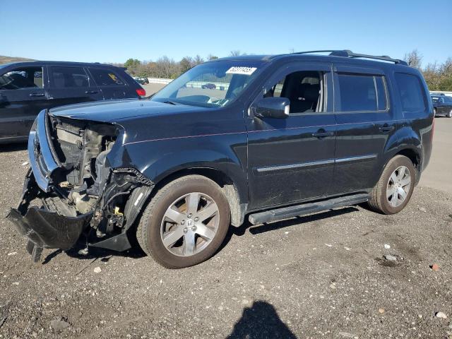 HONDA PILOT TOUR 2015 with VIN 5FNYF4H94FB033170 - Photo from auction