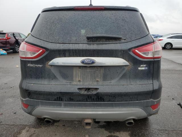Photo 6 from auction – 2014 FORD ESCAPE SE with VIN 1FMCU9G98EUD87628