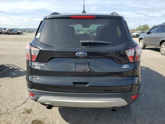 Photo 6 from auction – 2018 FORD ESCAPE SEL with VIN 1FMCU9HD9JUC24693