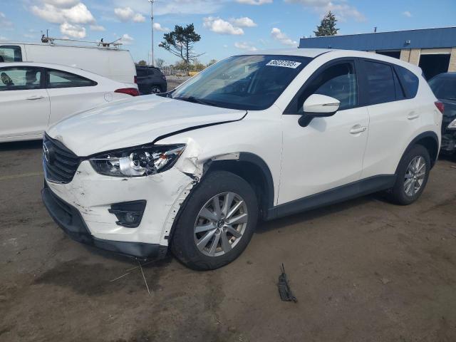 MAZDA CX-5 TOURI 2016 with VIN JM3KE4CY8G0920897 - Photo from auction
